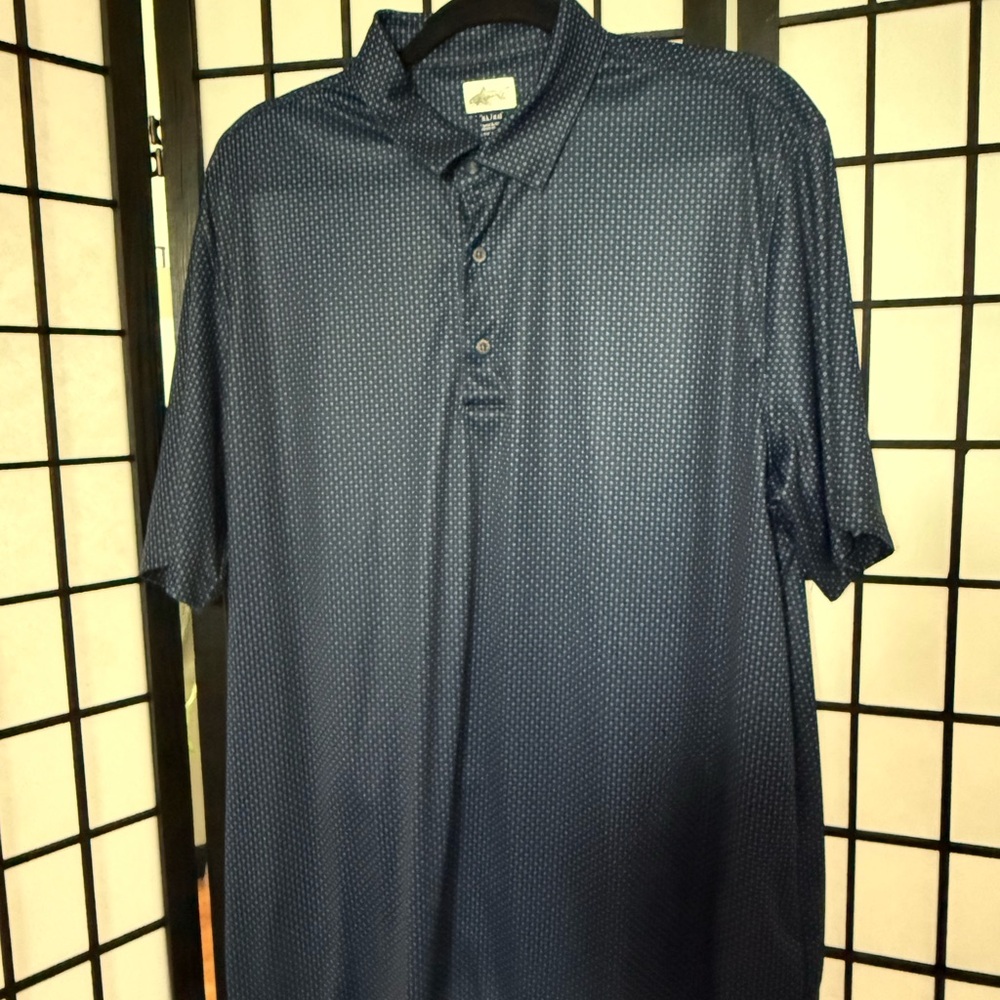 Blue and White Patterned Fabric - image 1